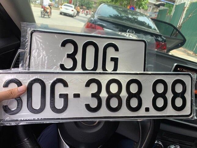 Đại biểu Quốc hội biểu quyết thông qua dự án luật, chiều 15/11. Ảnh Như Ý